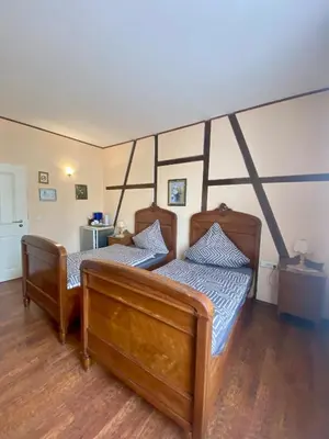 Ein Bett oder Betten in einem Zimmer der Unterkunft Hotel An der Lantert