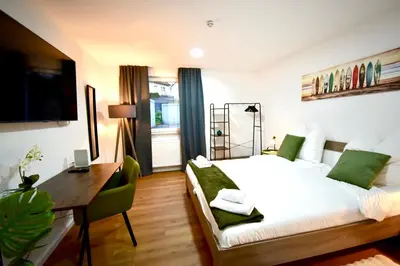 Ein Bett oder Betten in einem Zimmer der Unterkunft SANO - Hagen - Am Rastebaum
