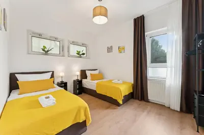 Ein Bett oder Betten in einem Zimmer der Unterkunft Gemütliche und ruhige Ferienwohnung in Wuppertal