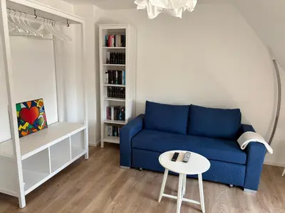 Ein Sitzbereich in der Unterkunft Ruhiges und citynahes Dachgeschoss-Nest
