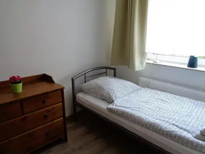 Ein Bett oder Betten in einem Zimmer der Unterkunft Big House in Duisburg - maximal 6 Persons with Garden
