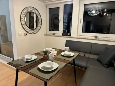 Ein Sitzbereich in der Unterkunft Mirko City Center Apartment