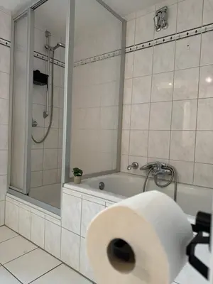 Ein Badezimmer in der Unterkunft Mirko City Center Apartment