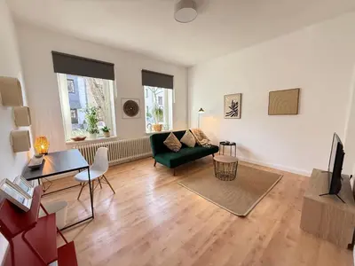 Ein Sitzbereich in der Unterkunft PURAVIDA Moderne, gemütliche 2-Zimmer-Wohlfühloase zentral in Oberhausen