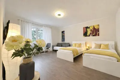 Ein Bett oder Betten in einem Zimmer der Unterkunft VAJAGIC 3 - Apartment 6 Pers, 2 Schlafzimmer, Messe, Uni Klinik