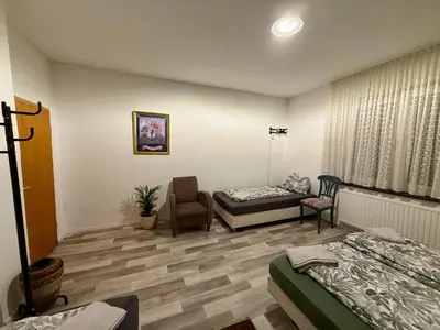 Ein Sitzbereich in der Unterkunft My Apartments&Rooms 04