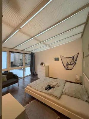 Ein Bett oder Betten in einem Zimmer der Unterkunft Themenzimmer Beach Cozy Nähe Hauptbahnhof
