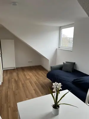 Ein Sitzbereich in der Unterkunft Ferienwohnung Ruhrperle