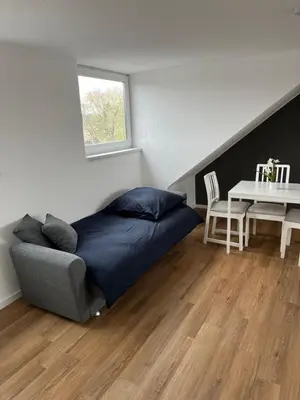 Ein Sitzbereich in der Unterkunft Ferienwohnung Ruhrperle