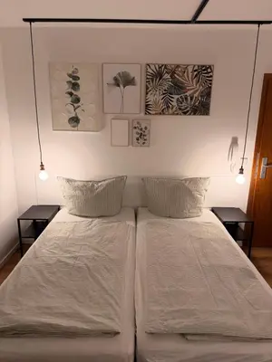 Ein Bett oder Betten in einem Zimmer der Unterkunft Saniertes Apartment für Paare und Geschäftsreisende in Recklinghausen Röllinghausen