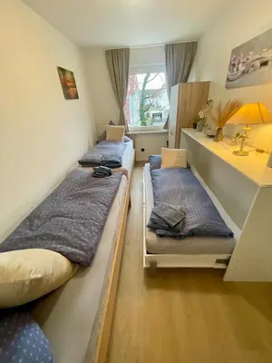 Ein Bett oder Betten in einem Zimmer der Unterkunft Ferienwohnung Emma