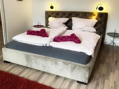 Ein Bett oder Betten in einem Zimmer der Unterkunft Spacious and Comfy Apartment in Wuppertal
