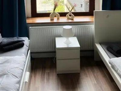 Ein Bett oder Betten in einem Zimmer der Unterkunft Spacious and Comfy Apartment in Wuppertal