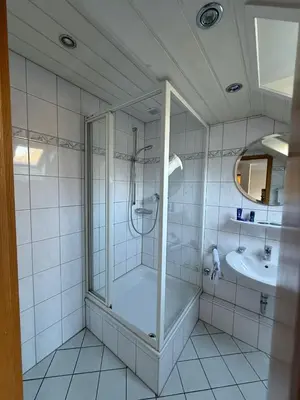Ein Badezimmer in der Unterkunft Wirtshaus zur Heimlichen Liebe