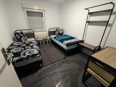 Ein Bett oder Betten in einem Zimmer der Unterkunft Mego Unterkünfte 3