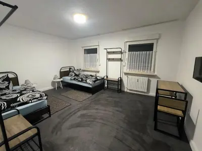 Ein Bett oder Betten in einem Zimmer der Unterkunft Mego Unterkünfte 3