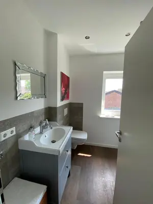 Ein Badezimmer in der Unterkunft Bed and Breakfast Orange-Inn