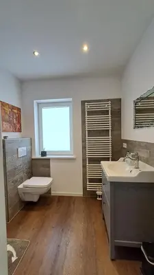Ein Badezimmer in der Unterkunft Bed and Breakfast Orange-Inn