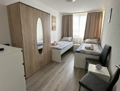 Ein Bett oder Betten in einem Zimmer der Unterkunft Modernes Apartment mit Balkon