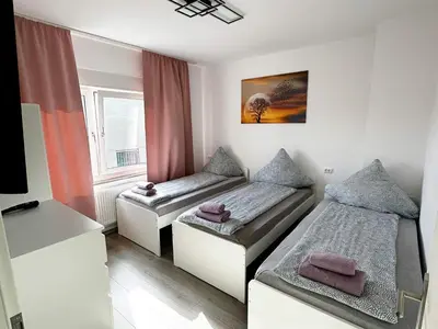 Ein Bett oder Betten in einem Zimmer der Unterkunft Gemütliche Apartments in Herten