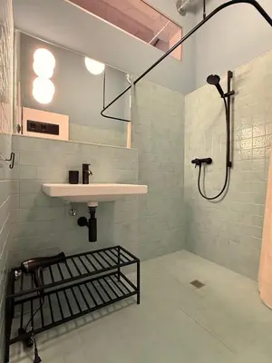 Ein Badezimmer in der Unterkunft Das SILO