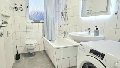 Ein Badezimmer in der Unterkunft 3 Zimmer I Küche I Balkon I WLAN I Parken I Seepark