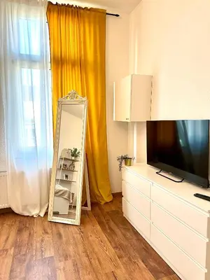TV/Unterhaltungsangebot in der Unterkunft Modernes Apartment mit Altbau Flair nähe Messe Düsseldorf