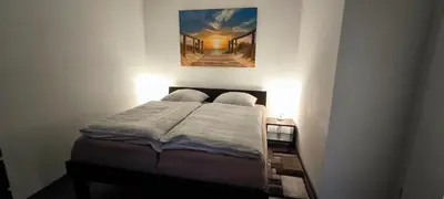 Ein Bett oder Betten in einem Zimmer der Unterkunft Panorama-Penthouse