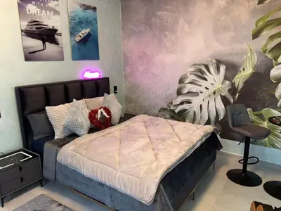 Ein Bett oder Betten in einem Zimmer der Unterkunft Aura Spa Herne Premium