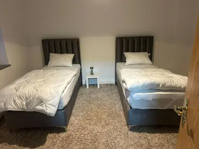 Ein Bett oder Betten in einem Zimmer der Unterkunft Monteurzimmer Auras