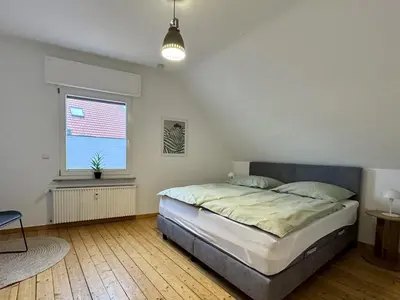 Ein Bett oder Betten in einem Zimmer der Unterkunft Altstadt Apartment Deluxe 3