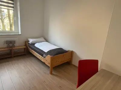 Ein Bett oder Betten in einem Zimmer der Unterkunft City Apartment 3 #Netflix &Wlan &Kaffee Maschine & Zentral & 500m Innenhafen & 2 min U Bahn