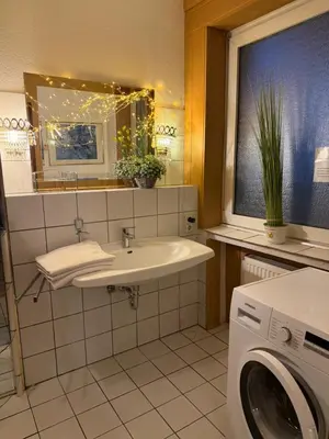 Ein Badezimmer in der Unterkunft City Adler Apartment