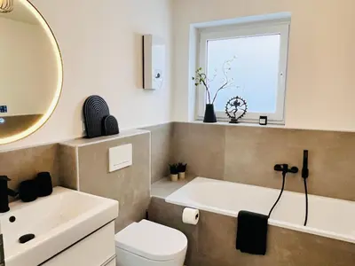 Ein Badezimmer in der Unterkunft Apartment LilaMoon Unna Dortmund Flughafen Parkplatz Netflix Disney plus 80qm Erdgeschoss