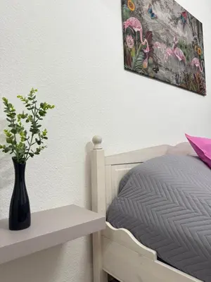 Ein Bett oder Betten in einem Zimmer der Unterkunft Time Wohnung