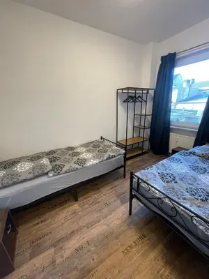 Ein Bett oder Betten in einem Zimmer der Unterkunft Oberhausen Apartment