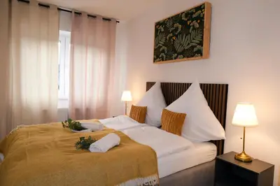 Ein Bett oder Betten in einem Zimmer der Unterkunft Deluxe House mit Terrasse & Garten - Komfort & Raum