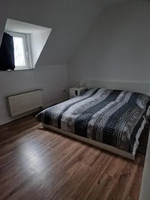 Ein Bett oder Betten in einem Zimmer der Unterkunft Modern FeWo in DU-Neudorf zentral & top location