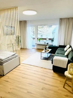 Ein Sitzbereich in der Unterkunft MOLA Apartments-Ruhrnahes Apartment mit Balkon & Parkplatz im Herzen von Schwerte-4P