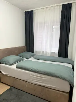 Ein Bett oder Betten in einem Zimmer der Unterkunft Günstige, zentrale und schöne Wohnung in Wuppertal