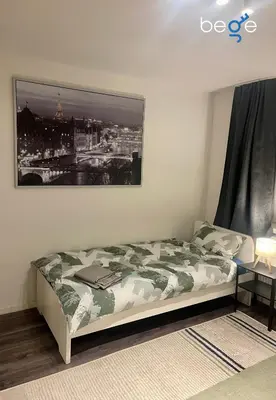 Ein Bett oder Betten in einem Zimmer der Unterkunft BEGE APARTMENTS ClearDesk