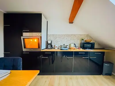 Küche/Küchenzeile in der Unterkunft Modernes 2-Schlafzimmer City Apartment mit Arbeitsplatz