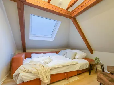 Ein Bett oder Betten in einem Zimmer der Unterkunft Modernes 2-Schlafzimmer City Apartment mit Arbeitsplatz