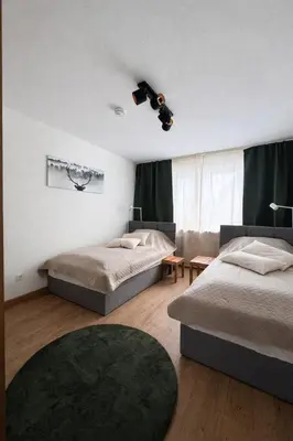 Ein Bett oder Betten in einem Zimmer der Unterkunft Holiday apartment im Bergischen Land