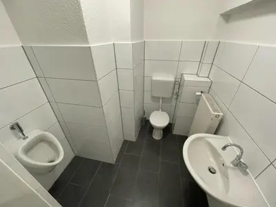 Ein Badezimmer in der Unterkunft Einzelzimmer im Monteurhaus Gemeinschaftsbad und Küche