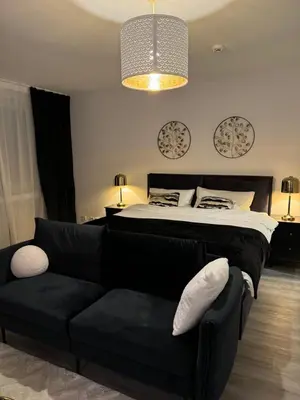 Ein Sitzbereich in der Unterkunft Cozy City Apartment