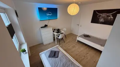 Ein Bett oder Betten in einem Zimmer der Unterkunft GNA02 - Zeitgemäße Apartments mit modernen Küchen, Balkon & Parkplatz
