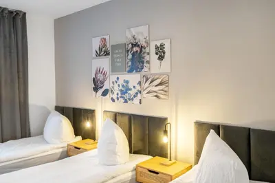 Ein Bett oder Betten in einem Zimmer der Unterkunft JAKSE-Apartments - Exklusive Unterkunft Bochum für Geschäftsreisende