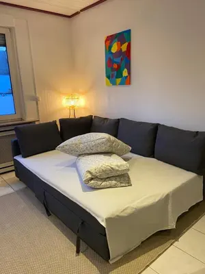 Ein Bett oder Betten in einem Zimmer der Unterkunft Kaiserviertel Gastromeile, City, Messe & Stadionnah