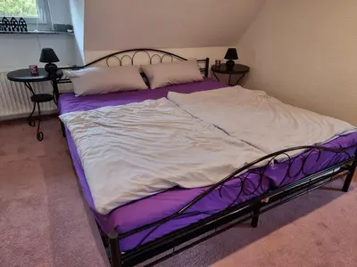 Ein Bett oder Betten in einem Zimmer der Unterkunft Schnuckelchen in Marl 2